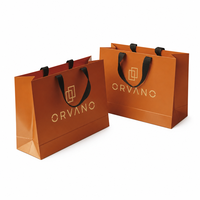Sac cadeau de luxe en papier rigide écologique avec logo personnalisé, poignées en ruban noir, emballage de vente au détail haut de gamme, vente en gros, directement de l'usine