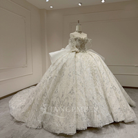 Robe de mariée Jancember XX93 luxueuse, épaules dénudées, décolleté cœur, avec nœud bouffant et longue traîne