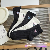 Chaussettes mi-mollet brodées pour femme, style décontracté et tendance, motif color block noir et blanc, respirantes, pour le printemps