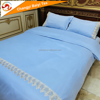 Vente directe d'usine Literie Broderie en dentelle Housse de couette Polyester brossé Housse de lit de luxe Ensemble de housse de couette et de taie d'oreiller