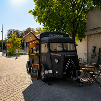 Camionnette alimentaire électrique rétro personnalisée Citroën avec gril à salamandre commercial pour burgers en centre historique