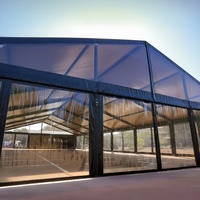 Tente de mariage transparente à cadre noir - Structure en aluminium sur mesure avec toit transparent pour événements de luxe en plein air