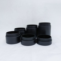 Vente en gros d'emballages alimentaires cosmétiques 100ml 150ml 200ml 250ml 300ml Pot de crème cosmétique en plastique PET noir ambré avec couvercle noir blanc