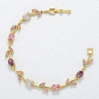 Bracelet unisexe tendance en forme de feuilles torsadées plaqué or avec zircon, idéal pour la vente en gros