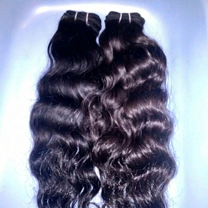 ผมแท้ REMI HAIR แบบธรรมชาติ ลอนอินเดีย ต่อผมแบบ Remy น้ำหนัก 100 กรัม เย็บสองชั้นด้วยเครื่องจักร ทุกสี ใช้ได้ ไม่มีสารเคมี ขายดีในปี 2025 - Product Image 1