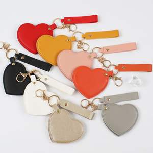 Custom Logo Small Pu Leather Mirror Keychain Travel Rotatable Heart Makeup Cosmetic Pocket <b>Vanity</b> Mini Hand Mirror Keychain - Product Image 1