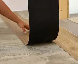Carreaux de vinyle auto-adhésifs imperméables en bois de luxe les moins chers pour revêtements de sol en PVC LVT