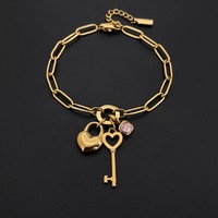 Pulsera de Cadena de Acero Inoxidable Chapada en Oro de 14K para Mujer, con Cierre de Corazón, Llave y Circonita Rosa, Joyería Emanco