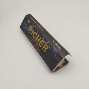 Papel de fumar personalizado Skin 108mm al por mayor OEM negro tamaño King Size Slim XL, papel de liar orgánico de grado alimenticio con filtros - Product Image 1