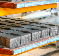 Machine automatique de production de briques en béton Machine de fabrication de blocs creux en béton de terre comprimée Machine de fabrication de briques en ciment