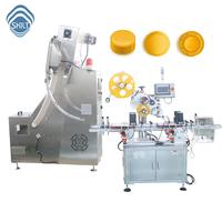 Máquina de etiquetado de superficie superior autoadhesiva de tapa de botella automática personalizada de fábrica SKILT fabricante de PLC desde 1998