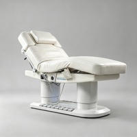 Table de massage électrique chauffante de luxe à 4 moteurs avec commande au pied et base LED pour salon de beauté, spa médical et clinique des cils