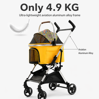 Poussette pour chien avec roues amortissantes, frein double à un doigt, roue avant pivotante, cadre pliable en aluminium, OEM ODM