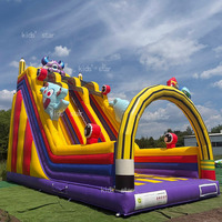 Toboggan gonflable commercial d'extérieur, château gonflable à thème de dessin animé, conception personnalisée pour enfants et adultes, parc d'attractions