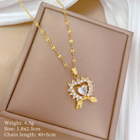 Colliers en gros en acier inoxydable avec pendentif double cœur ailé creux en zircon pour femmes, bijoux de mode en vrac