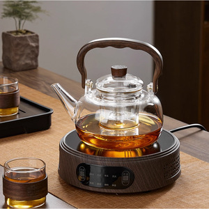 Tetera de vidrio de borosilicato alto con mango de madera, resistente al calor, para uso en el hogar y la oficina - Product Image 1