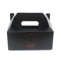 Boîte en papier personnalisée noire mate avec poignée, emballage pour plats à emporter, cadeaux de vin, impression métallique cuivrée, vente en gros