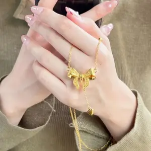 Patlayıcı Vietnam kum altın moda prenses yay püskül aşk 24K altın kaplama köprükemiği zincir paslanmaz çelik kaplama kolye