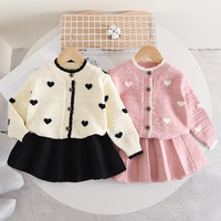 Ensemble de vêtements d'automne et d'hiver pour filles jupe tricotée pull creux en forme de cœur ensemble deux pièces à manches longues vêtements pour enfants