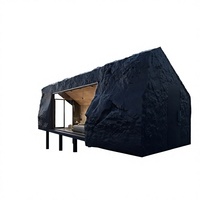 Maison préfabriquée de luxe en pierre noire, maison en pierre moderne, cabane modulaire de glamping, hôtel, maison écologique miniature surélevée et étanche pour complexe hôtelier
