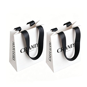 Luxury Custom Logo Paper Bags With Handles Wholesale White Gift Shopping Bag Boutique Retail Packaging Supplier - Product Image 1