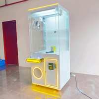 Machine de jeu d'arcade à monnayeur pour un joueur, type grue à griffes néon, en verre transparent, pour attraper les poupées