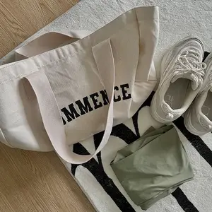 Vente en gros Logo imprimé Sac fourre-tout en toile de coton blanc uni réutilisable à bas prix avec personnalisation