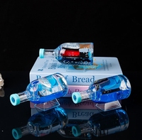 Décoration de table en forme de bouteille flottante lumineuse avec bateau à voile, bouteille ronde avec gouttes d'huile flottantes, porte-stylo pour étudiant, cadeau d'anniversaire