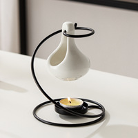 Diffuseur d'arômes créatif moderne et minimaliste en céramique noire en forme de goutte d'eau, lampe à huile essentielle, chauffe-cire pour bougies domestiques