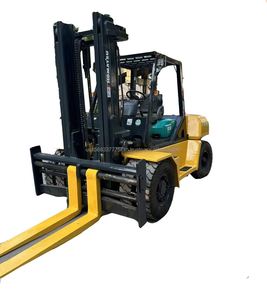 รถยกดีเซล Komatsu FD100 มือสอง รับน้ำหนัก 10 ตัน เสากระโดงสอง/สามท่อน ยางตัน สำหรับใช้งานนอกพื้นที่ - Product Image 1
