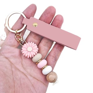 Porte-clés Silicone Perles Marguerite Fleur Breloque Sac Dragonne Poignet Fait Main Style Coréen Cadeau pour Femme - Product Image 4
