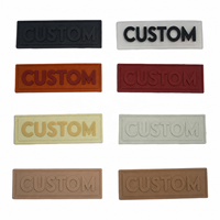 Logo de marque en relief personnalisé, étiquette en Pvc 3d souple, patchs en caoutchouc pour vêtement, vente en gros