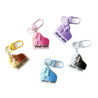 Porte-clés mini piano à queue en résine dégradée, breloque instrument de musique gaufrée avec note musicale, accessoire de sac pour les amateurs de musique