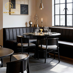 Juego de Muebles Modernos para Cafetería: Mesa Redonda de Piedra Sinterizada Negra, Sillas de Tela, Sofá de Cuero, Asientos para Restaurante - Product Image 1