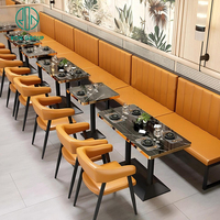 Ensemble de meubles de restaurant de restauration rapide moderne et luxueux, avec canapé en pierre frittée carrée, cuir orange, table et chaises