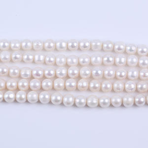 Perles d'eau douce naturelles en forme de riz, 10-11 mm, blanches, pour la fabrication de colliers et de bracelets, en gros, provenant de Zhuji - Product Image 1