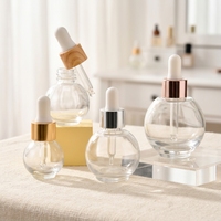 Flacon compte-gouttes en verre rond OEM, 10 ml, 20 ml, 30 ml, 50 ml, flacon transparent pour sérum, huile essentielle, flacon compte-gouttes en verre cosmétique