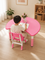 Ensemble table et chaises demi-lune pour enfants avec surface rose pour le dessin, la lecture et les activités de groupe en classe et en garderie
