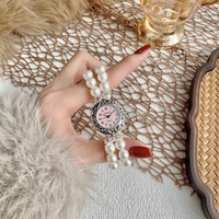 Montre à bracelet élastique avec pointeur de mode, montre à quartz en acier inoxydable avec verre, bracelet de montre en perles pour femmes