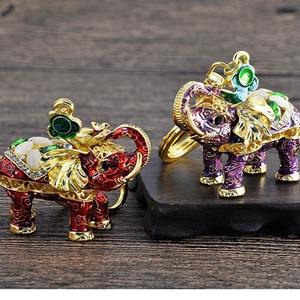 सुंदर हाथी कीचेन स्पार्कलिंग लक्जरी कीरिंग क्रिस्टल पर्स पेलेंट गैंडे हैंडबैग कार कुंजी सहायक उपकरण - Product Image 3