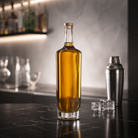 Bouteille de liqueur en verre transparent cylindrique de 700 ml, bouteille en verre à fond épais irrégulier pour la vodka, le gin, les spiritueux, vente en gros