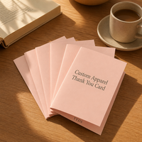 Tarjetas de agradecimiento personalizadas para ropa, color crema marfil, plegables, con impresión minimalista en serifo, inserto de marca, consejos de cuidado y código QR para boutiques de ropa.