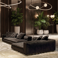 Canapé inclinable incurvé moderne Riley, haut de gamme, style nordique minimaliste, rembourrage en éponge, revêtement premium pour maison, villa ou projet.