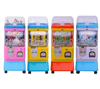 Vitrine d'exposition haut de gamme à un seul niveau avec système de paiement par pièces et jetons pour distributeur automatique de capsules de jouets 24h/24 et 7j/7 pour articles de vente au détail.
