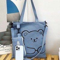 Élégante trousse à crayons en toile avec sangle et fermeture éclair, style frais et doux, sac bandoulière polyvalent pour femme, collection Hiver 2024
