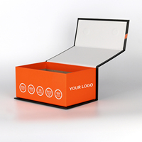 Nouvelle boîte d'emballage pliable magnétique en carton noir pour vêtements, avec logo personnalisé en usine et impression UV