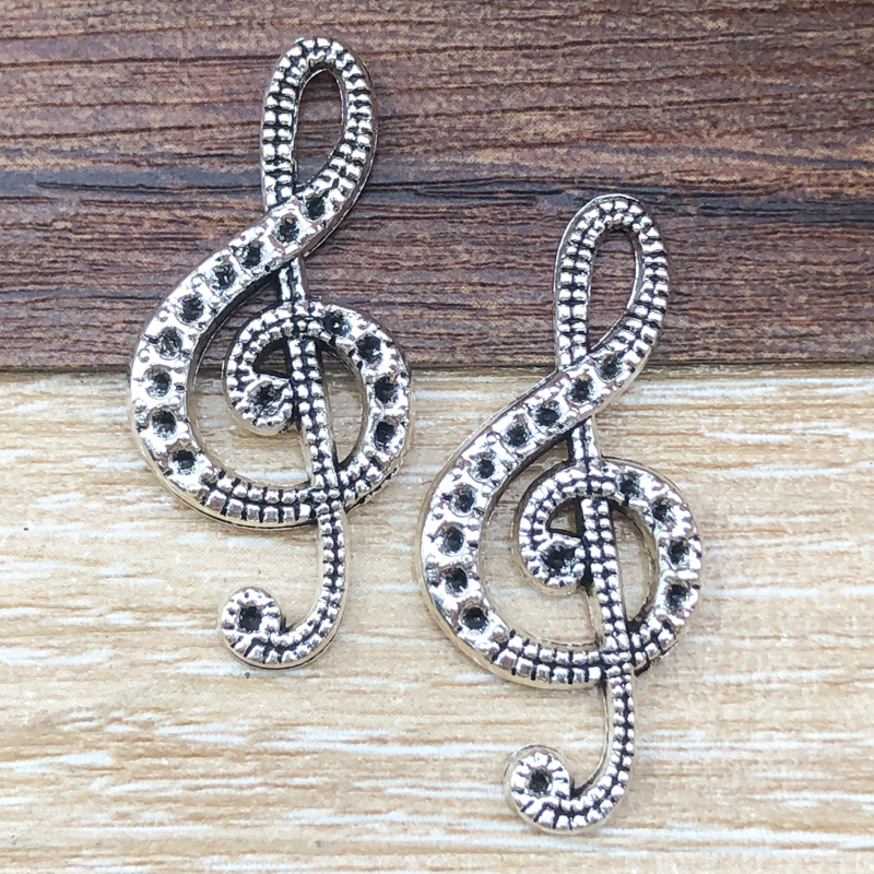 Une note de musique, 15*33 mm, 1,8 g, 7410