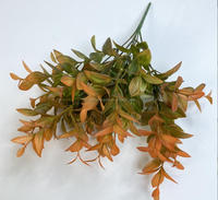 Vente en gros Bouquet de feuilles vertes artificielles Feuilles de vanille Plantes artificielles Plante de remplissage de verdure pour décoration extérieure de mariage