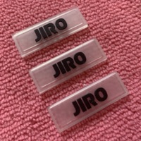 Étiquette en caoutchouc transparente avec logo en relief, étiquettes en caoutchouc de silicone écologiques avec lignes de couture