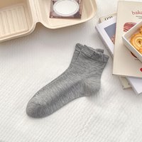 Chaussettes pour femmes en coton doux et confortable de couleur unie, vente en gros d'usine